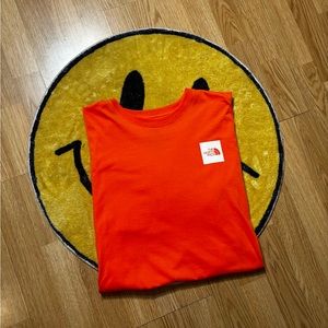 men’s orange short sleeve The North Face shirt